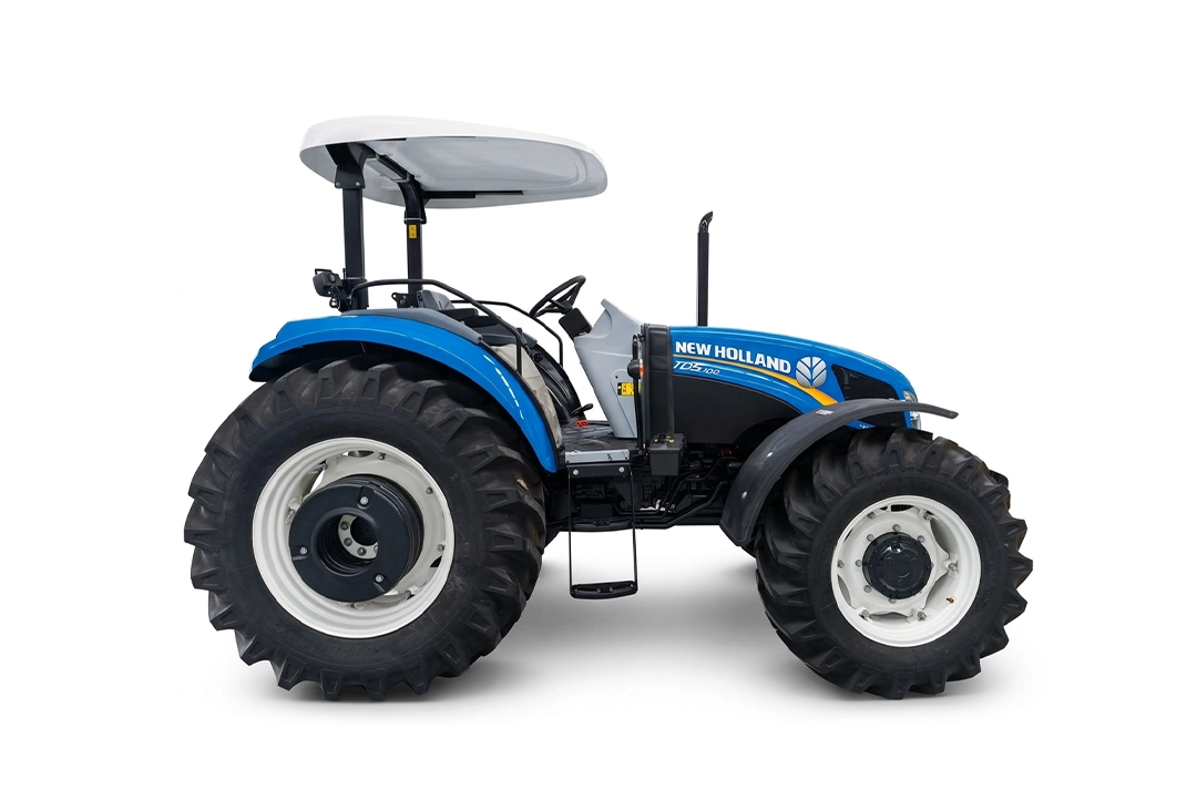 Tractor agrícola New Holland TD5.100 azul de perfil con techo de protección sobre fondo blanco.