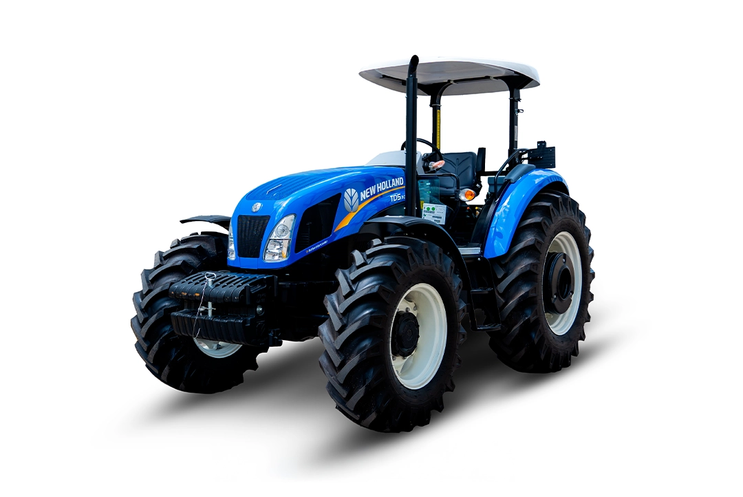 Tractor agrícola New Holland TD5.110 azul de perfil con techo de protección sobre fondo blanco.