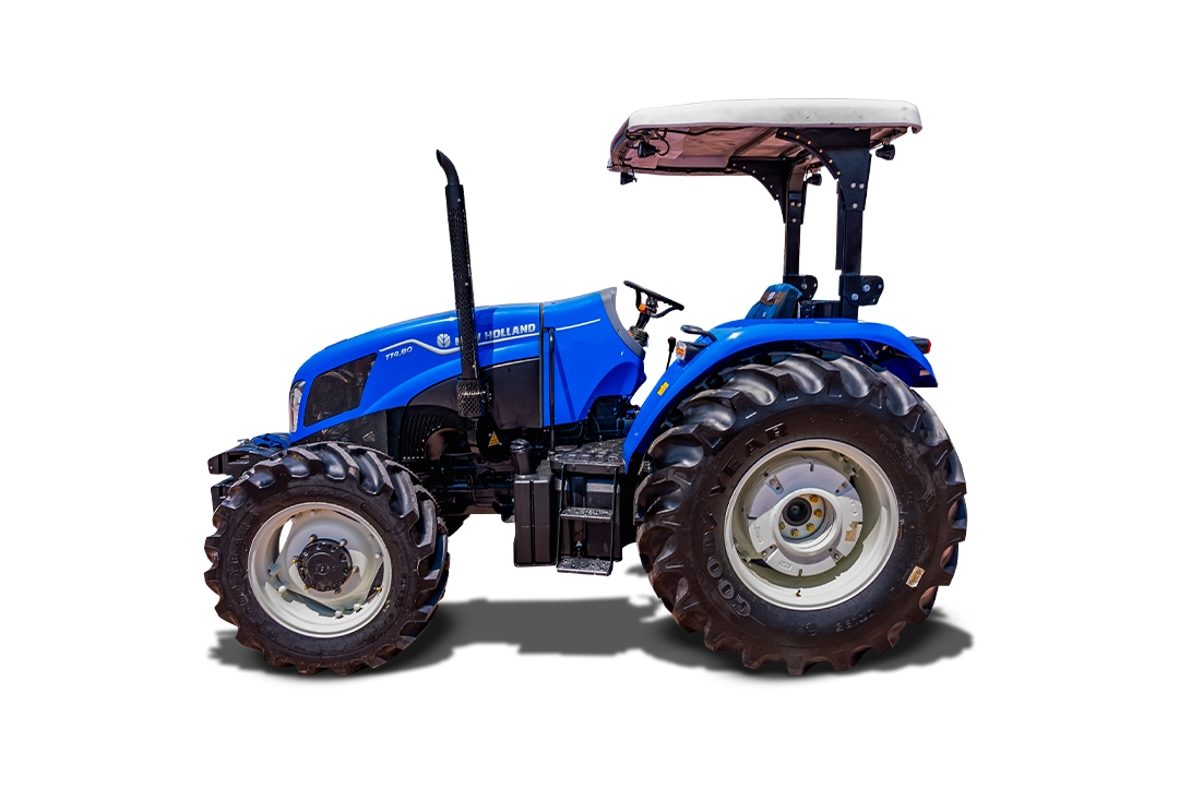 Tractor agrícola New Holland TT4.80 azul de perfil sobre fondo blanco.